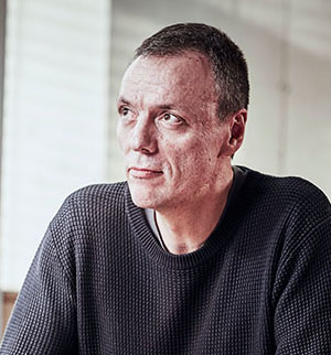 Headshot of Cesare Birignani, looking to the left.