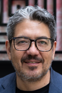 Headshot of Arturo Ortiz Struck, smiling at the camera.