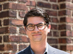 Headshot of Paul Farber smiling at the camera.