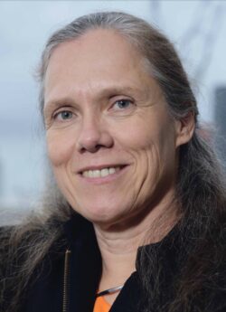 Headshot of Carola Hein smiling at the camera.