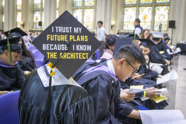 A student's cap that reads 