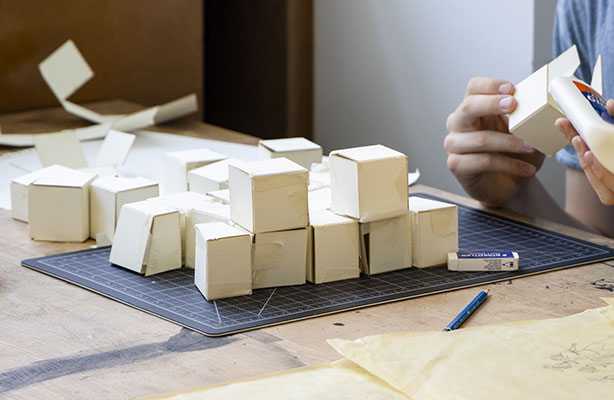 photo: making 3D boxes by hand with glue