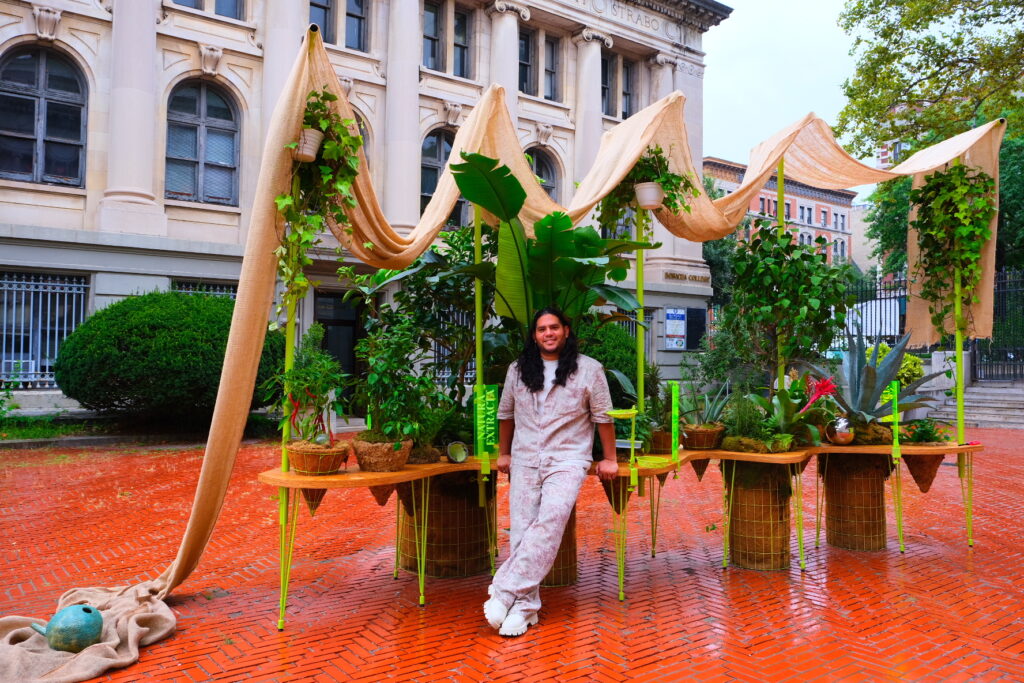 Wide full shot of an outdoor botanical installation titled 